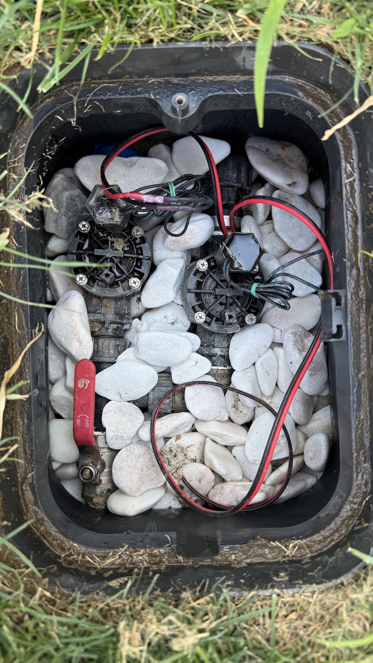 The valve box — Rain Bird valves, manual shutoff and waterproof splices